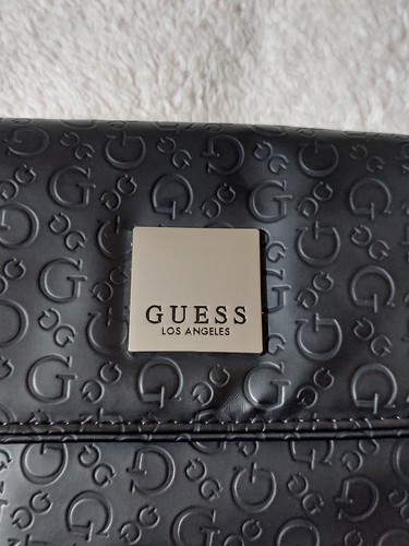 Brand new guess clutch hand - brand,